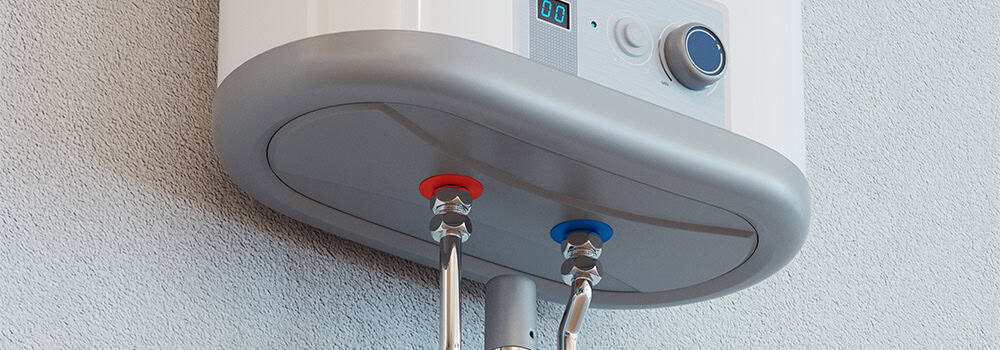 Close-up view of the bottom of a tankless water heater mounted on a wall. Visible are water inlet and outlet connections with labeled red and blue taps for hot and cold water. The control panel with dial and digital display is also visible, highlighting the efficiency compared to traditional gas vs electric hot water tanks.